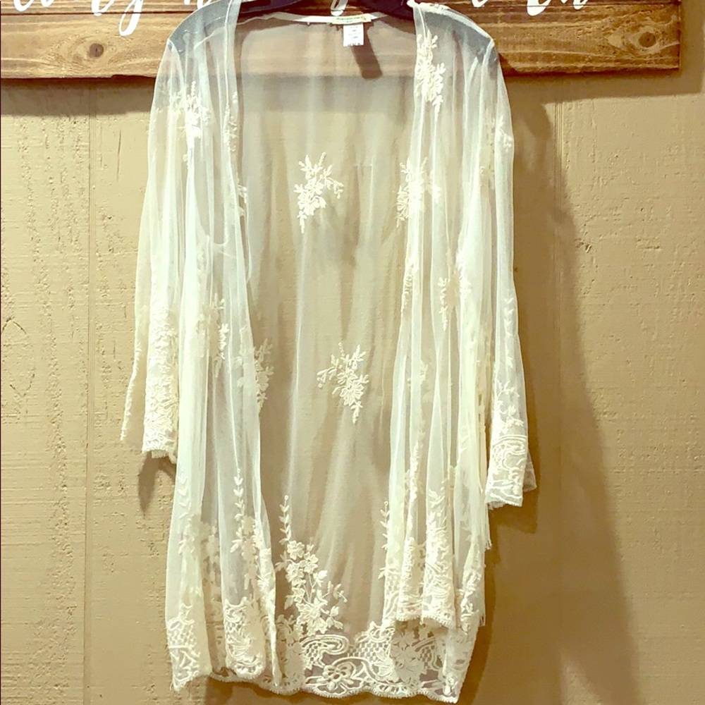 Beautiful cream lace shrug.